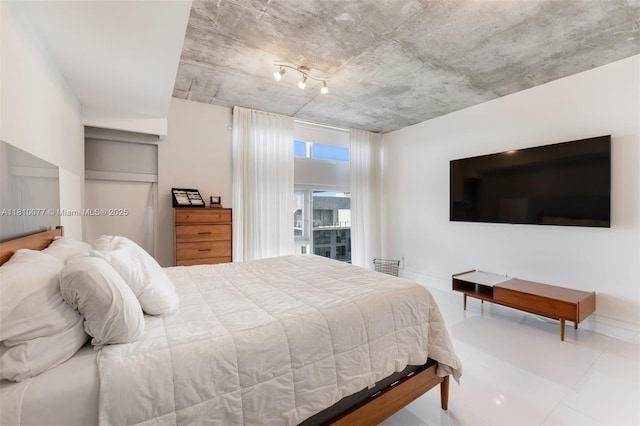 3301 NE 1st Ave Unit Ph7, Miami, FL 33137 - bedroom featuring baseboards