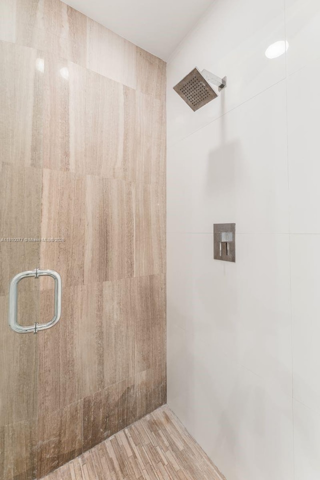 3301 NE 1st Ave Unit Ph7, Miami, FL 33137 - bathroom with a tile shower and wood finished floors