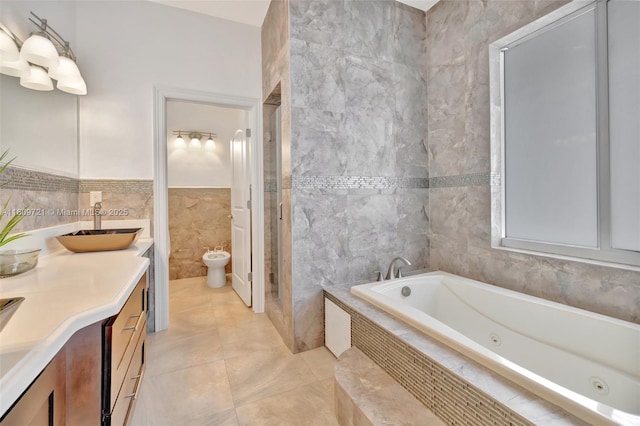 4610 SW 178th Ave, Southwest Ranches, FL 33331 - full bath featuring tile walls, vanity, a bidet, a whirlpool tub, and a stall shower