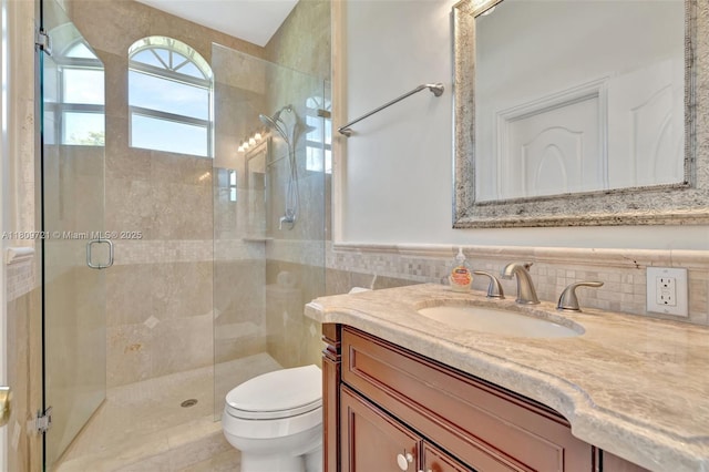 4610 SW 178th Ave, Southwest Ranches, FL 33331 - full bath with toilet, vanity, a stall shower, and tile walls