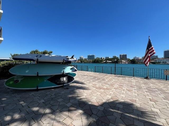 10101 E Bay Harbor Dr Unit 401, Bay Harbor Islands, FL 33154 - view of swimming pool with a water view and a view of city