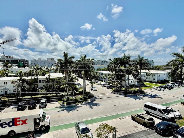 10101 E Bay Harbor Dr Unit 401, Bay Harbor Islands, FL 33154 - view of asphalt street with curbs, sidewalks, and street lights