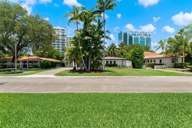 4250 Bay Point Rd, Miami, FL 33137 - view of front facade featuring a front yard