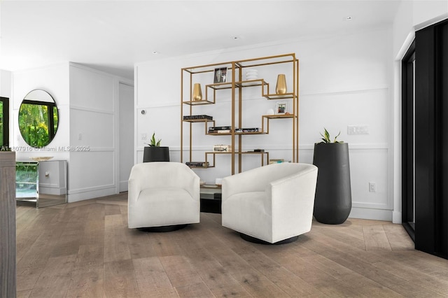 4250 Bay Point Rd, Miami, FL 33137 - sitting room featuring wood finished floors