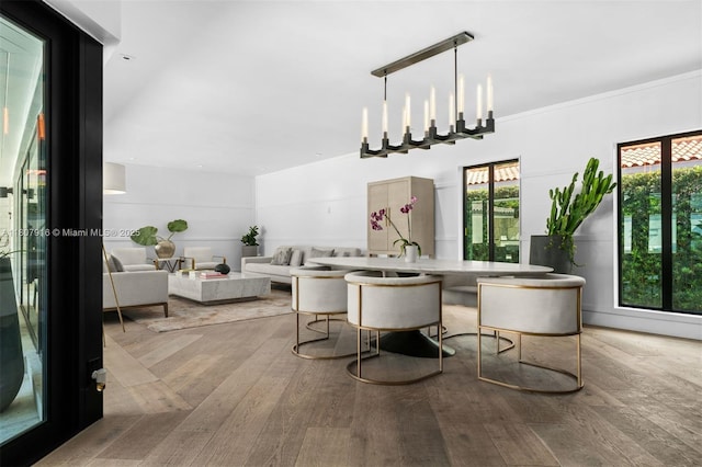 4250 Bay Point Rd, Miami, FL 33137 - dining space featuring wood finished floors