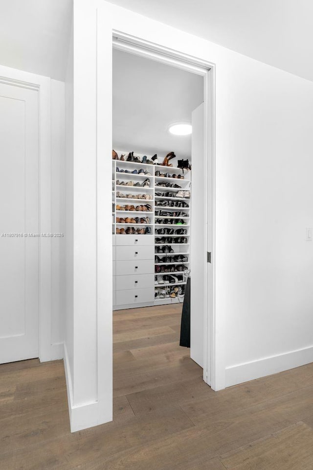 4250 Bay Point Rd, Miami, FL 33137 - wine area featuring wood finished floors and baseboards