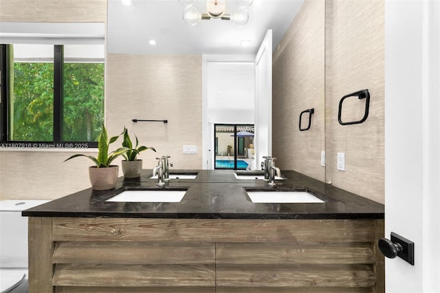 4250 Bay Point Rd, Miami, FL 33137 - bathroom with toilet and double vanity