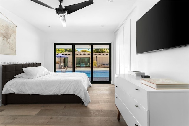 4250 Bay Point Rd, Miami, FL 33137 - bedroom featuring access to outside, light wood-style floors, and ceiling fan