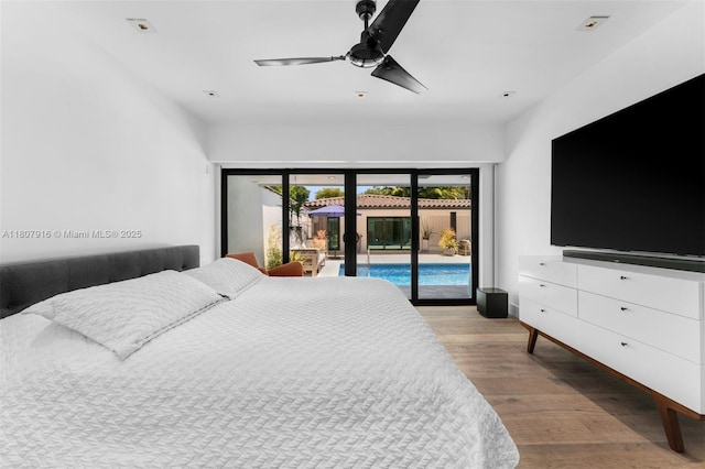 4250 Bay Point Rd, Miami, FL 33137 - bedroom featuring access to outside, wood finished floors, a ceiling fan, and baseboards