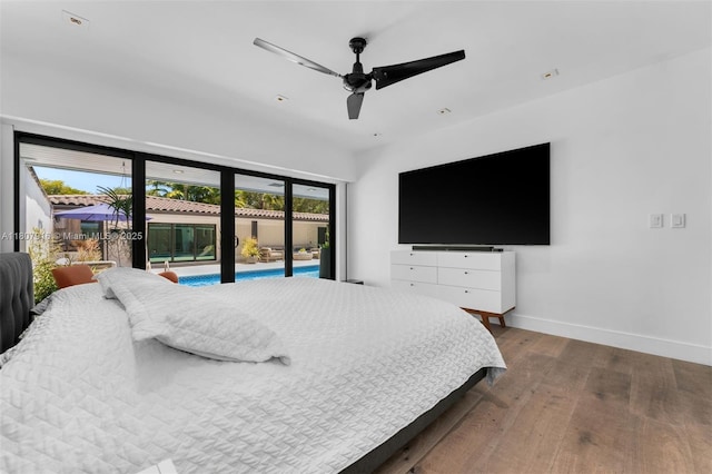 4250 Bay Point Rd, Miami, FL 33137 - bedroom with access to exterior, wood finished floors, baseboards, and a ceiling fan