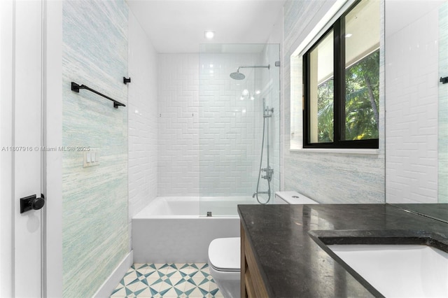 4250 Bay Point Rd, Miami, FL 33137 - bathroom featuring vanity, toilet, washtub / shower combination, and baseboards