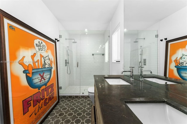 4250 Bay Point Rd, Miami, FL 33137 - bathroom with a shower stall, double vanity, and toilet