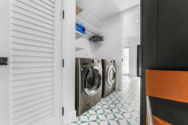 4250 Bay Point Rd, Miami, FL 33137 - laundry area featuring washer and dryer and light flooring