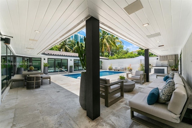 4250 Bay Point Rd, Miami, FL 33137 - fenced backyard featuring an outdoor hangout area and a patio area