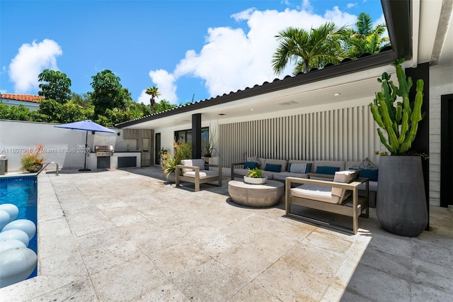 4250 Bay Point Rd, Miami, FL 33137 - view of patio with an outdoor living space and an outdoor pool