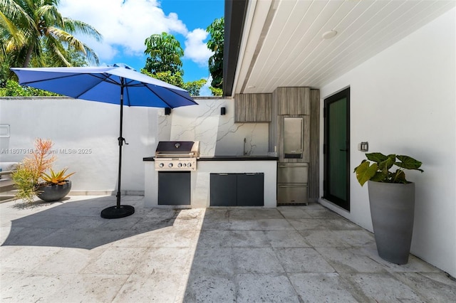 4250 Bay Point Rd, Miami, FL 33137 - view of patio / terrace with a sink