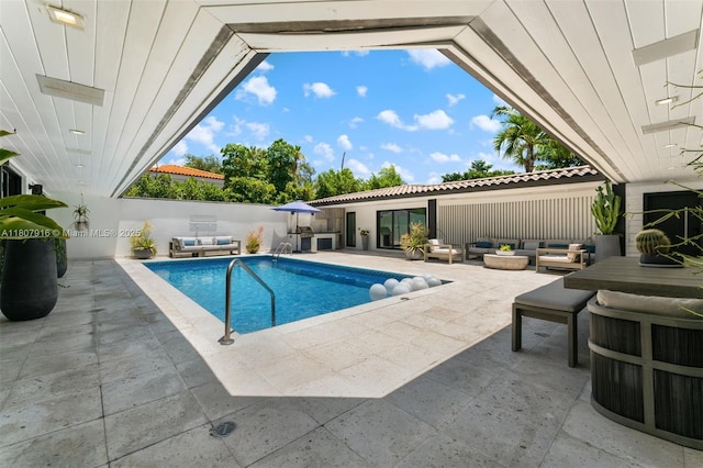 4250 Bay Point Rd, Miami, FL 33137 - view of pool with an outdoor living space and a patio