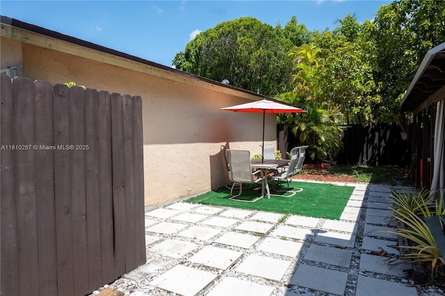 13284 SW 108th St Cir, Miami, FL 33186 - view of patio featuring outdoor dining area