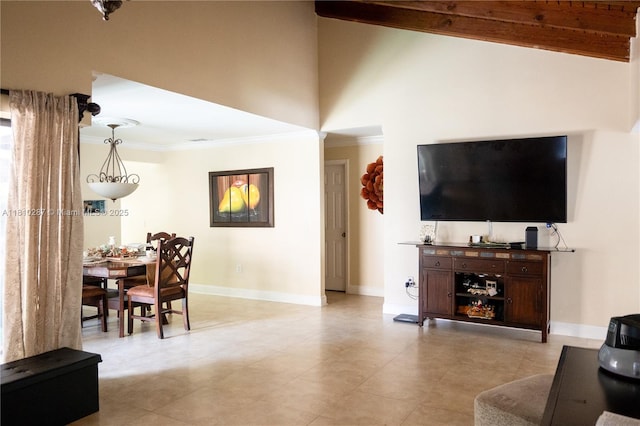 13284 SW 108th St Cir, Miami, FL 33186 - living room featuring ornamental molding, baseboards, high vaulted ceiling, and light tile patterned floors