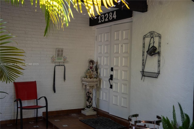 13284 SW 108th St Cir, Miami, FL 33186 - view of exterior entry featuring stucco siding