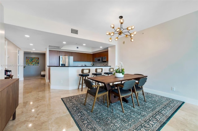 14951 Royal Oaks Ln Unit 901, North Miami, FL 33181 - dining space with a chandelier, recessed lighting, and baseboards