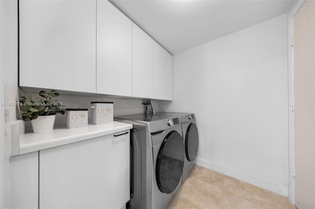 14951 Royal Oaks Ln Unit 901, North Miami, FL 33181 - laundry room featuring cabinet space, washer and clothes dryer, and baseboards