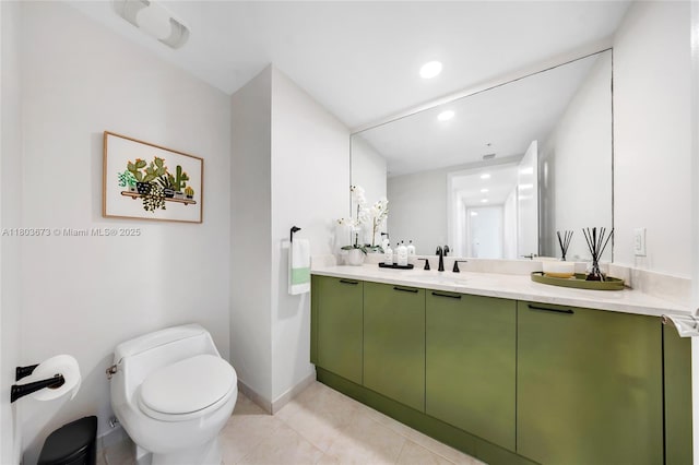 14951 Royal Oaks Ln Unit 901, North Miami, FL 33181 - bathroom featuring toilet, double vanity, tile patterned floors, recessed lighting, and baseboards