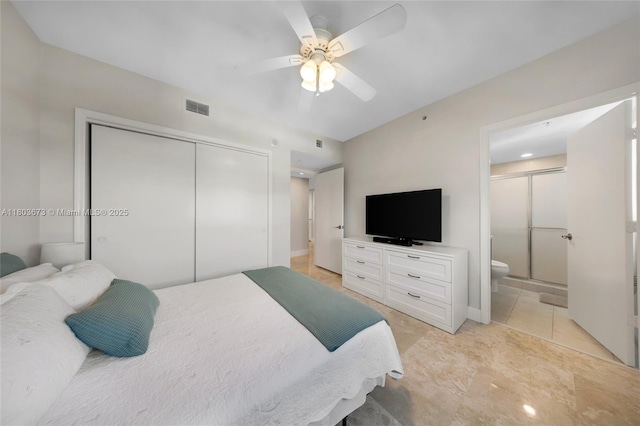 14951 Royal Oaks Ln Unit 901, North Miami, FL 33181 - bedroom with a closet, ensuite bath, ceiling fan, and light tile patterned floors
