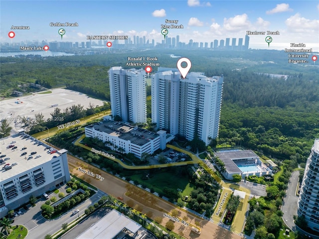 14951 Royal Oaks Ln Unit 901, North Miami, FL 33181 - drone / aerial view of skyline and a heavily wooded area