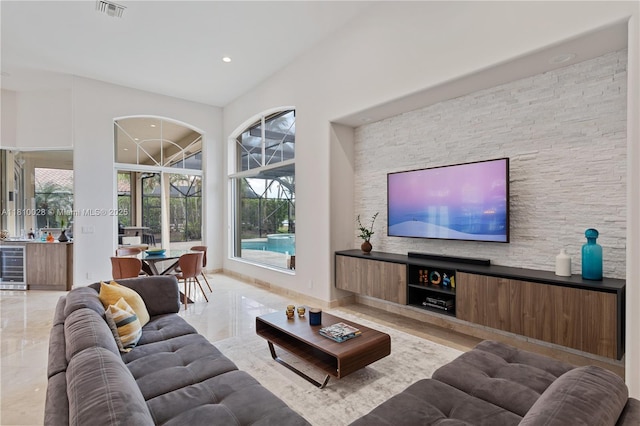 146 Dockside Cir, Weston, FL 33327 - living room featuring wine cooler and recessed lighting