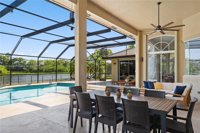 146 Dockside Cir, Weston, FL 33327 - view of patio with an outdoor pool, ceiling fan, outdoor dining space, and a lanai