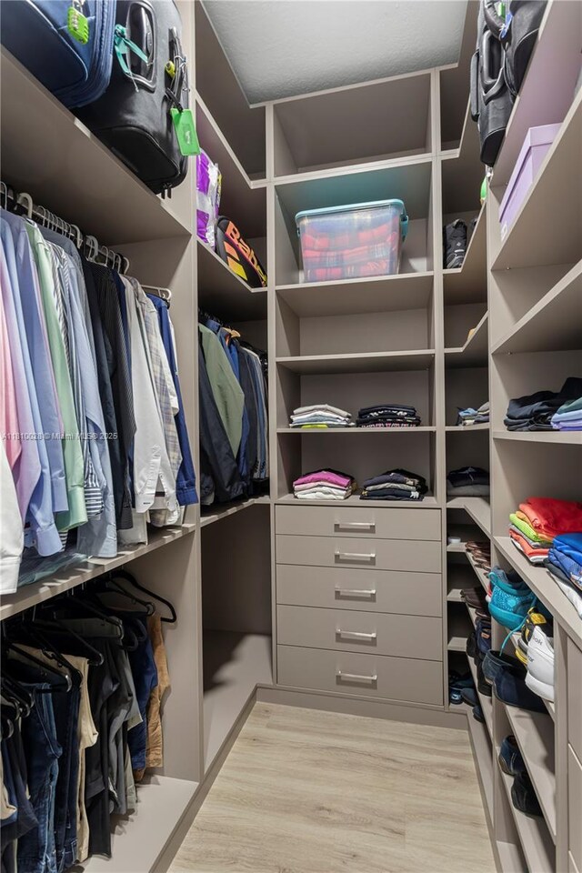 146 Dockside Cir, Weston, FL 33327 - walk in closet featuring light wood-type flooring