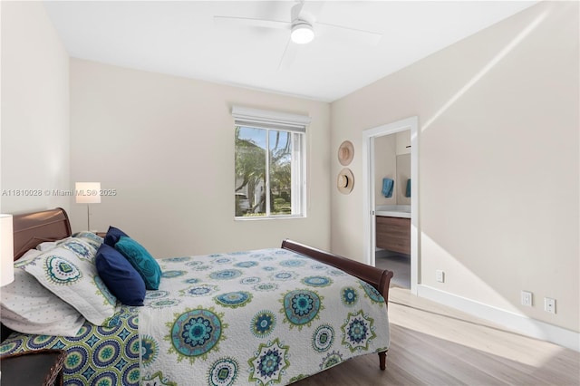 146 Dockside Cir, Weston, FL 33327 - bedroom featuring wood finished floors, baseboards, ceiling fan, and ensuite bathroom
