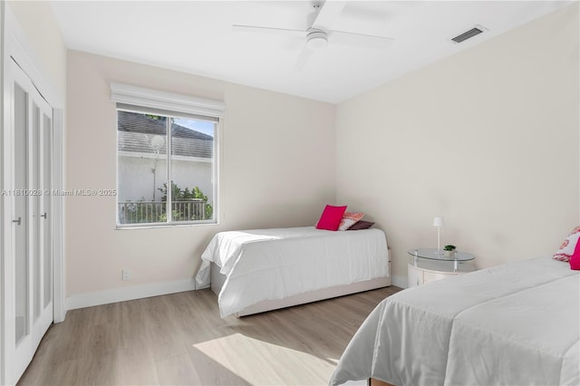 146 Dockside Cir, Weston, FL 33327 - bedroom featuring wood finished floors, baseboards, and ceiling fan