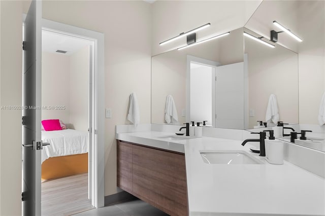 146 Dockside Cir, Weston, FL 33327 - bathroom with double vanity, ensuite bathroom, and tile patterned floors