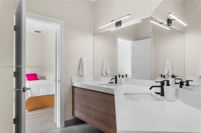 146 Dockside Cir, Weston, FL 33327 - bathroom with double vanity, ensuite bathroom, and tile patterned floors