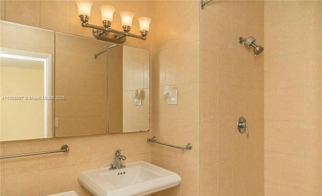 1215-1217 NE 16th Ave, Fort Lauderdale, FL 33304 - full bath featuring a sink, tiled shower, and tile walls