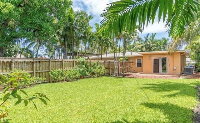 1215-1217 NE 16th Ave, Fort Lauderdale, FL 33304 - view of yard featuring central AC