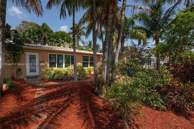 1215-1217 NE 16th Ave, Fort Lauderdale, FL 33304 - view of front of house with stucco siding