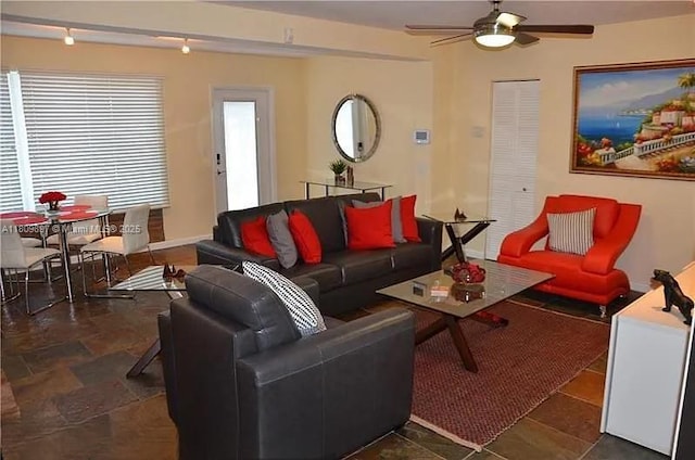 1215-1217 NE 16th Ave, Fort Lauderdale, FL 33304 - living room with a ceiling fan and baseboards