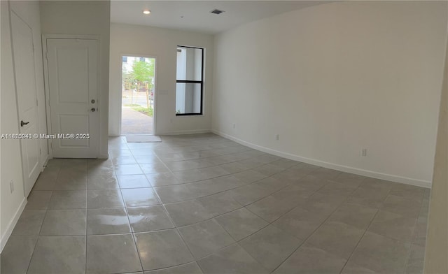245 SW 159th Ct, Pembroke Pines, FL 33027 - spare room with light tile patterned floors, baseboards, and recessed lighting