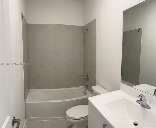 245 SW 159th Ct, Pembroke Pines, FL 33027 - bathroom featuring toilet, vanity,  shower combination, and tile patterned flooring
