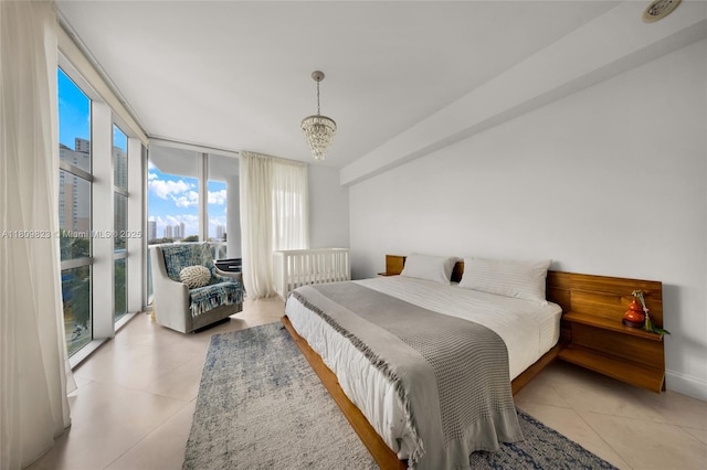 3131 NE 188th St Unit 2-506, Aventura, FL 33180 - bedroom with light tile patterned floors, a chandelier, floor to ceiling windows, and access to outside