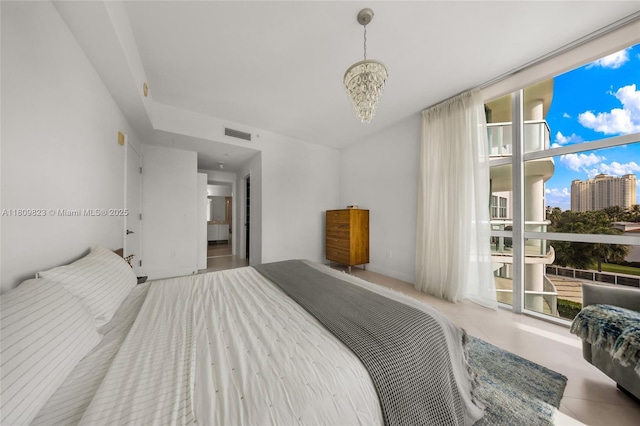 3131 NE 188th St Unit 2-506, Aventura, FL 33180 - bedroom with a chandelier and expansive windows