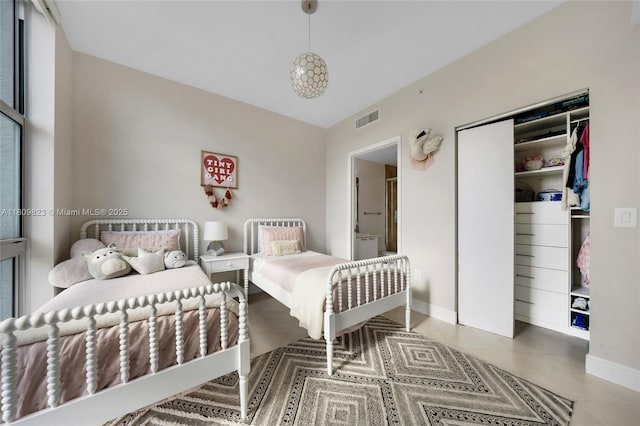 3131 NE 188th St Unit 2-506, Aventura, FL 33180 - tiled bedroom featuring baseboards and a closet