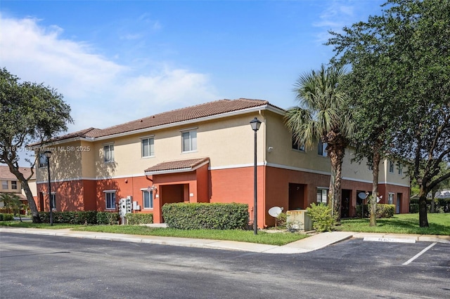 3340 Palomino Dr Unit 214-2, Davie, FL 33024 - view of property featuring uncovered parking