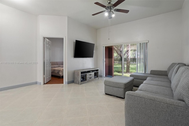 3340 Palomino Dr Unit 214-2, Davie, FL 33024 - living area with ceiling fan, light tile patterned flooring, and baseboards