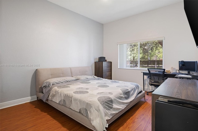 3340 Palomino Dr Unit 214-2, Davie, FL 33024 - bedroom featuring wood finished floors, an office area, and baseboards