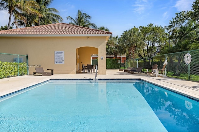 3340 Palomino Dr Unit 214-2, Davie, FL 33024 - community pool with a patio area