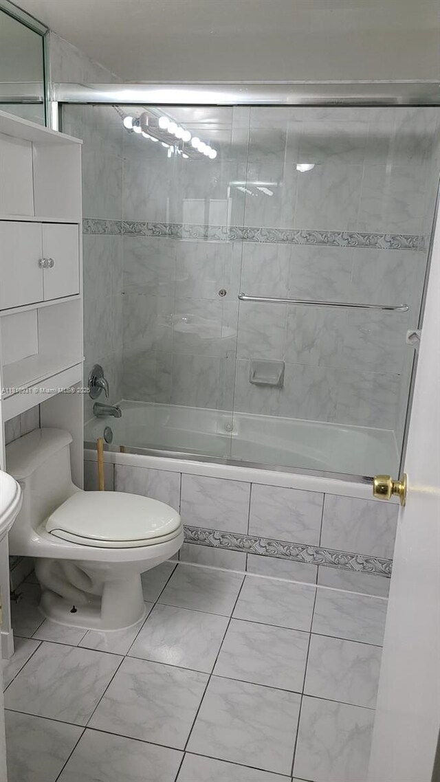 8540 N Sherman Cir Unit 204, Miramar, FL 33025 - full bathroom featuring toilet and tiled shower / bath